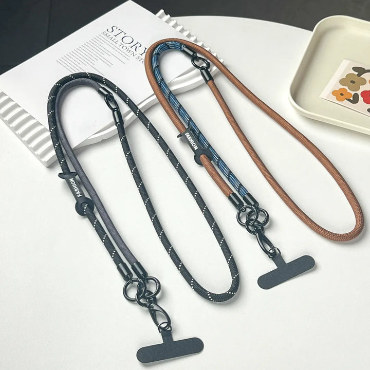 Durable and adjustable black leather phone leash providing extra security and conveniencel#color_black