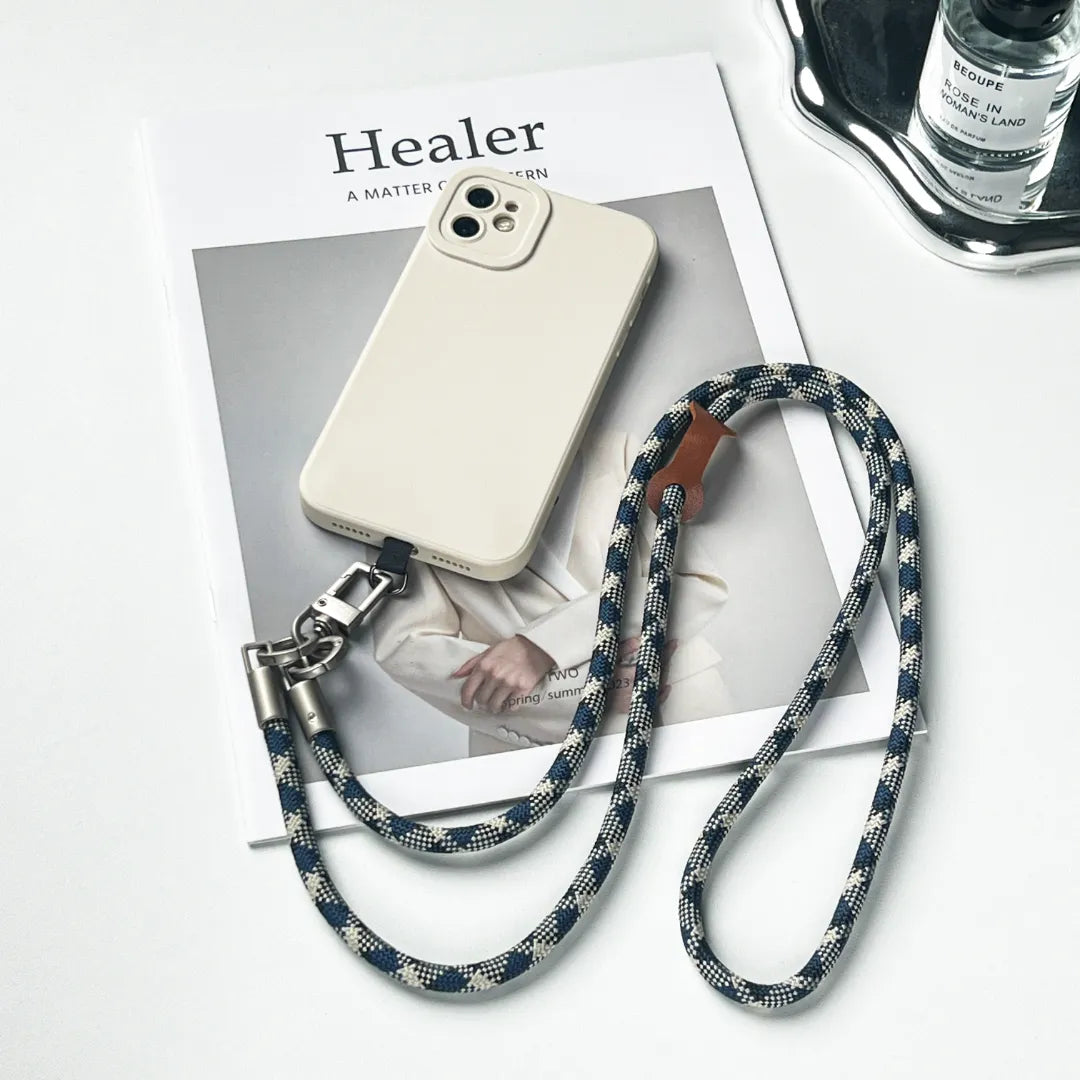 Adjustable patterned leather phone leash providing safety and style for mobile devices#color_blue