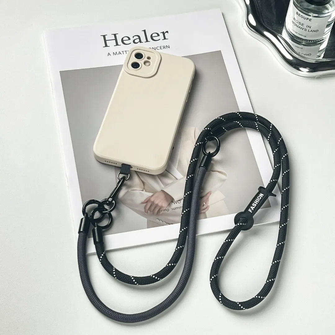 Anti-theft black phone lanyard with a crossbody strap design for safe outdoor activitiesl#color_black
