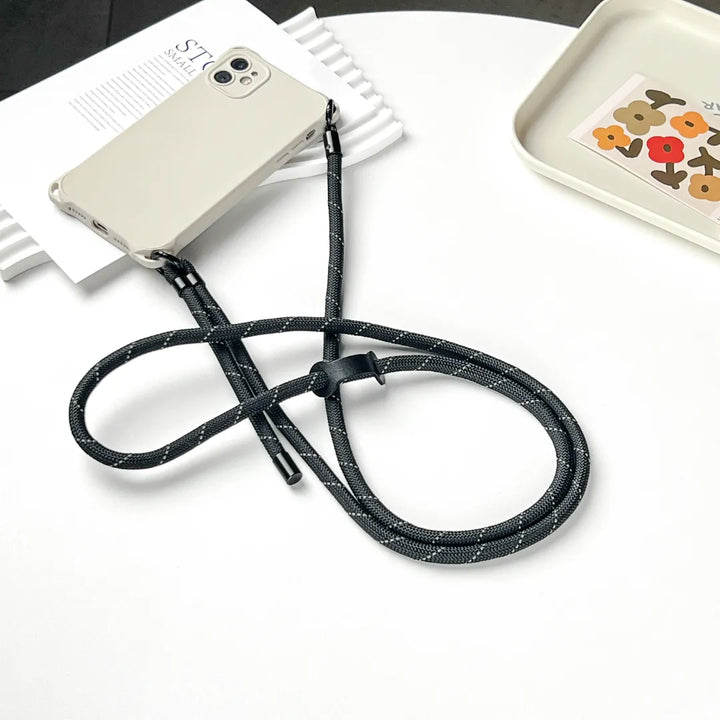 Black phone strap loop design displayed clearly, highlighting simple structure and practical daily use#color_black