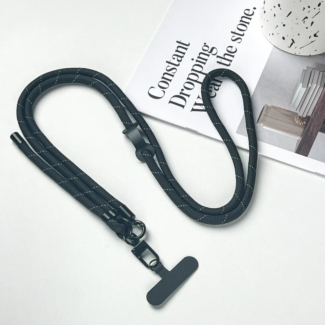 Detachable black phone strap structure shown clearly, allowing wrist, neck or crossbody wearing styles#color_black