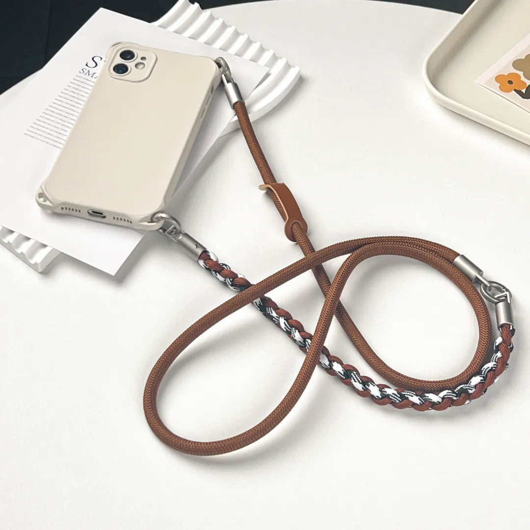 Stylish brown braided phone wrist strap designed for secure handheld use and anti-drop safety#color_brown