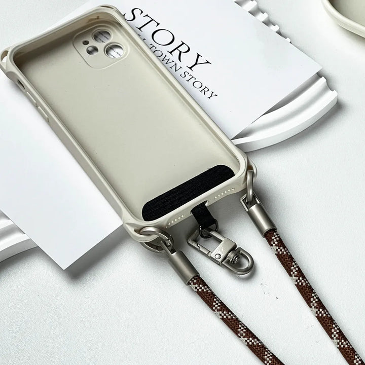 Secure brown and white phone wrist strap lanyard made of high quality woven leather#color_brown
