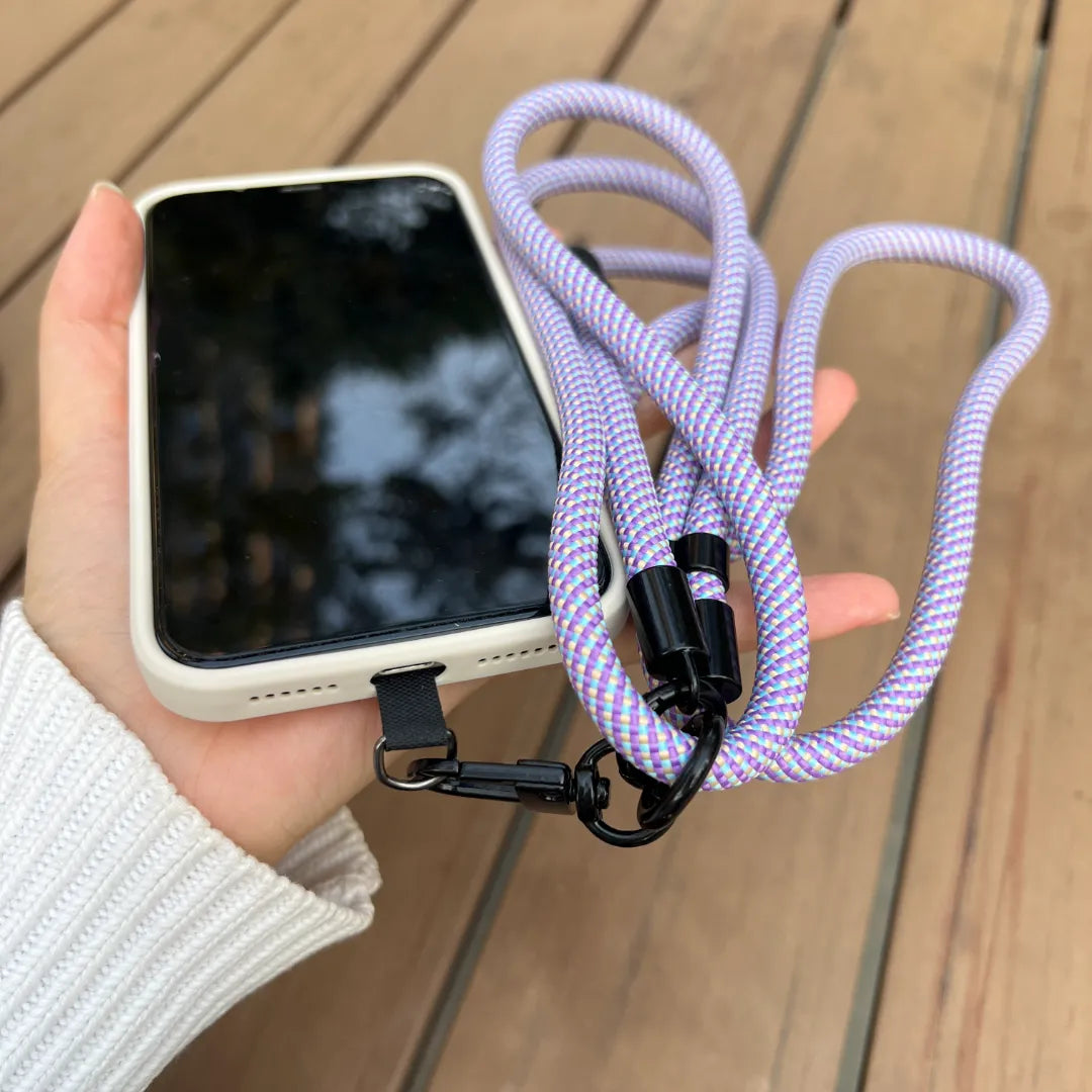 Lavender crossbody phone strap shown in hands free daily use, keeping the phone secure while moving comfortably#color_purple