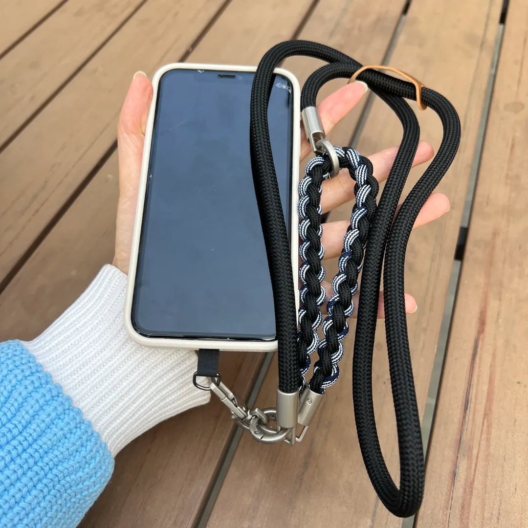 Crossbody rugged phone strap styled for utility use, keeping the phone secure during commuting or outdoor movement#color_black