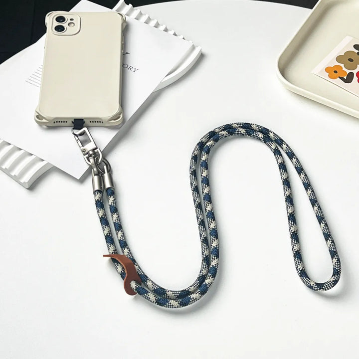 Exquisite grey and blue phone charm strap featuring a unique braided leather texture#color_blue