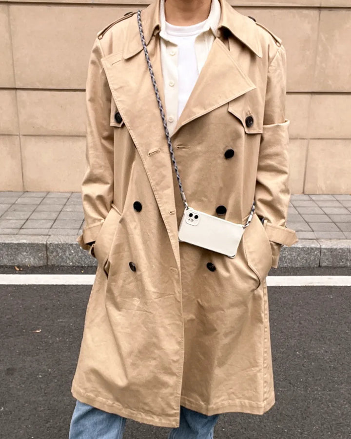 Outdoor fashion styling with a grey and blue phone lanyard for a sophisticated touch#color_blue