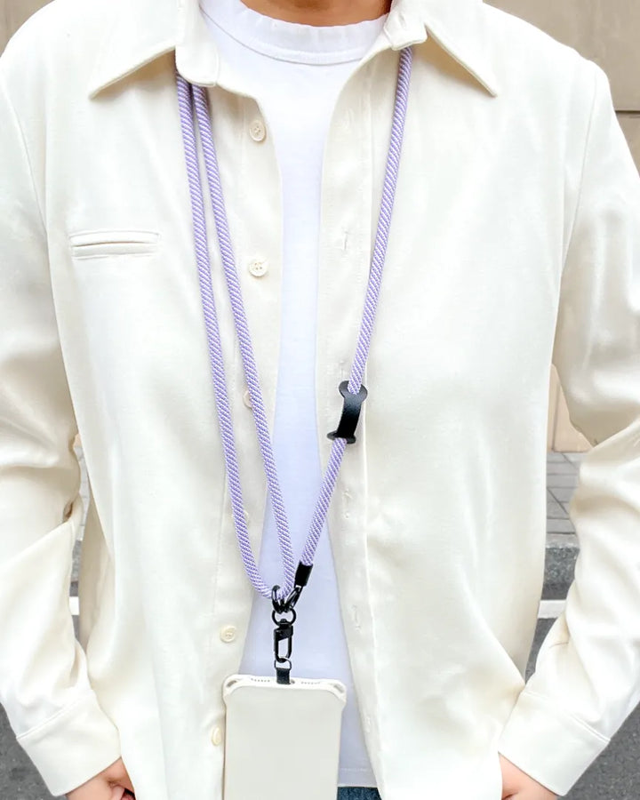 Lavender phone lanyard styled with everyday clothing, showing minimalist look and comfortable daily use#color_purple
