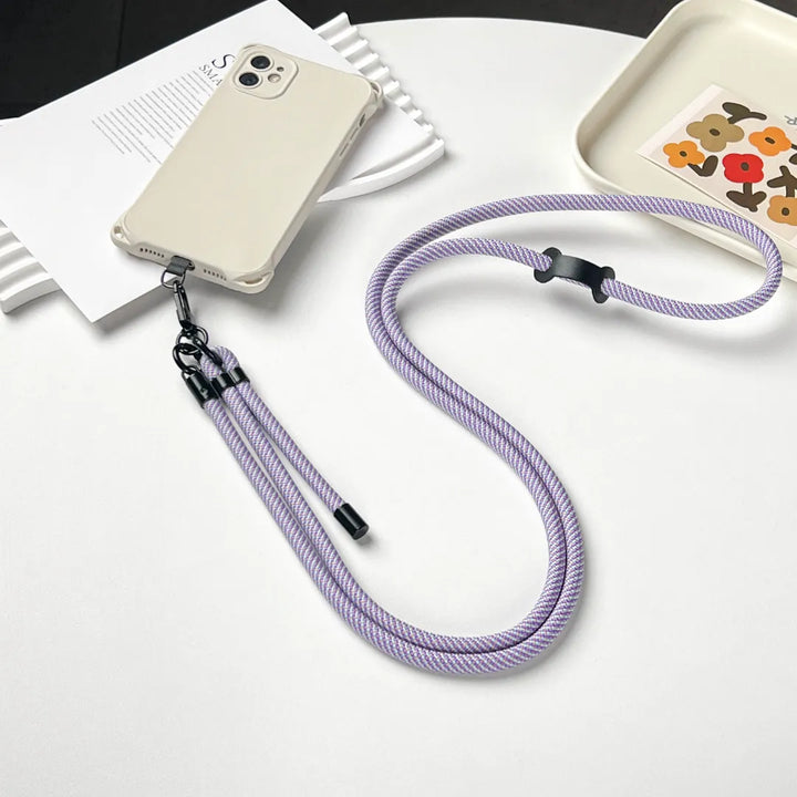 Adjustable length lavender phone strap shown clearly, suitable for different wearing preferences#color_purple