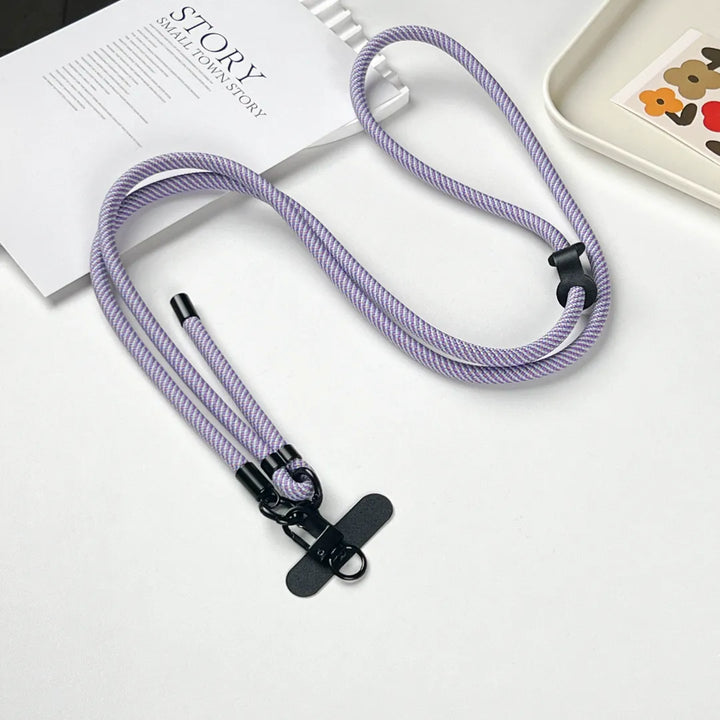 Lavender phone strap connection detail designed to reduce drops while maintaining lightweight structure#color_purple