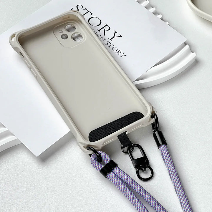 Connection detail of lavender phone strap attached to phone case, highlighting secure and stable support#color_purple