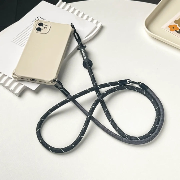 Fashionable black leather phone wristlet that adds a sleek touch to your mobile device accessoryl#color_black