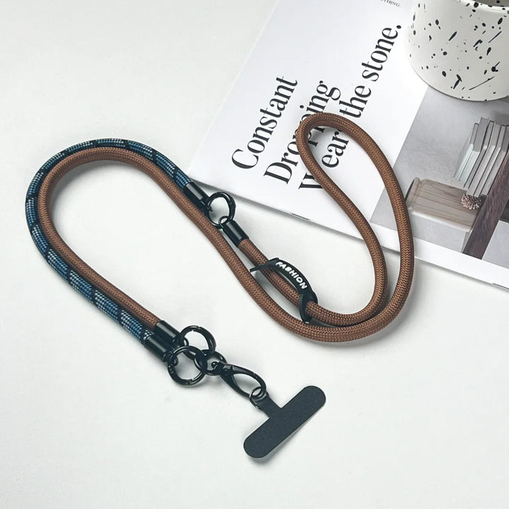 Sophisticated navy blue braided leather phone strap with gold hooks for a premium look#color_brown