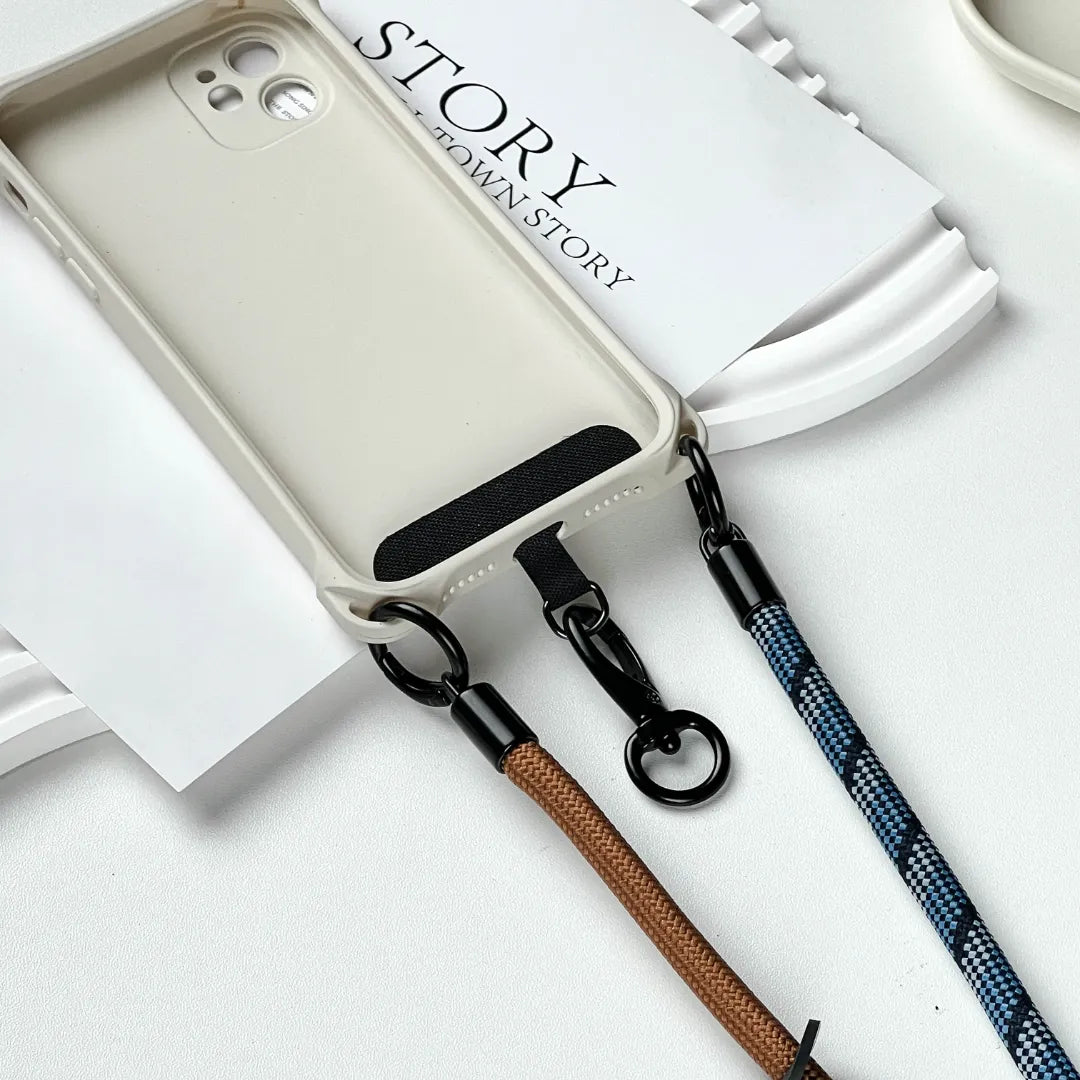 Stylish navy blue phone wrist strap made of braided leather for secure hand-carrying#color_brown