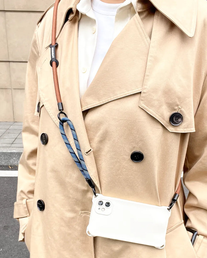 Elegant navy blue crossbody phone strap that complements any sophisticated wardrobe#color_brown