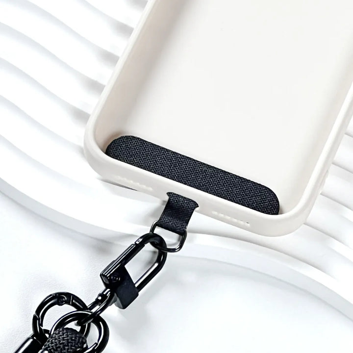 Phone case with lavender strap attached, demonstrating hands free carrying solution with cool tone style#color_purple