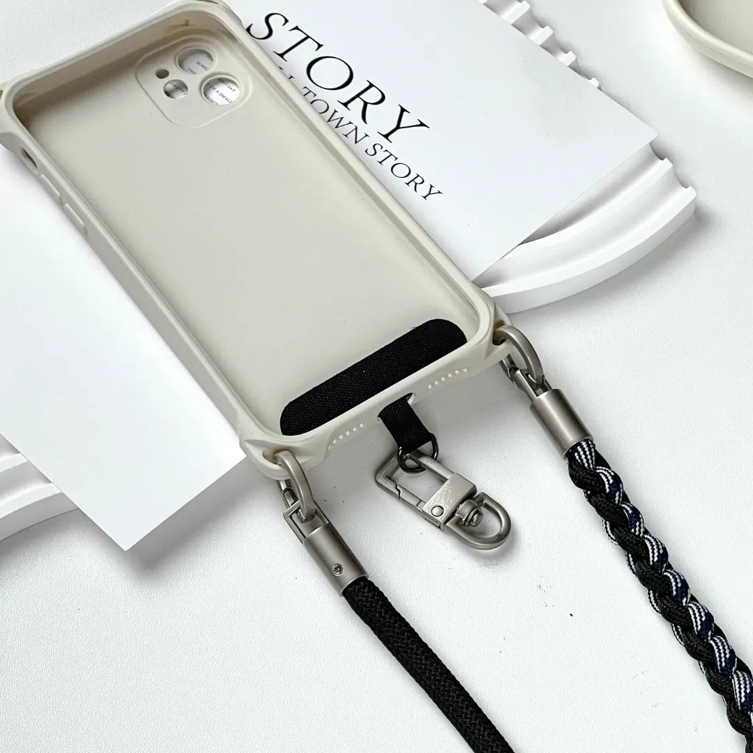 Phone case with rugged strap attached, demonstrating hands free carrying solution with reinforced design#color_black