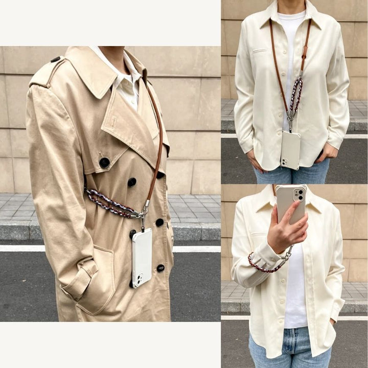 Lifestyle photography of a woman wearing a blue braided phone strap with a classic trench coat#color_brown