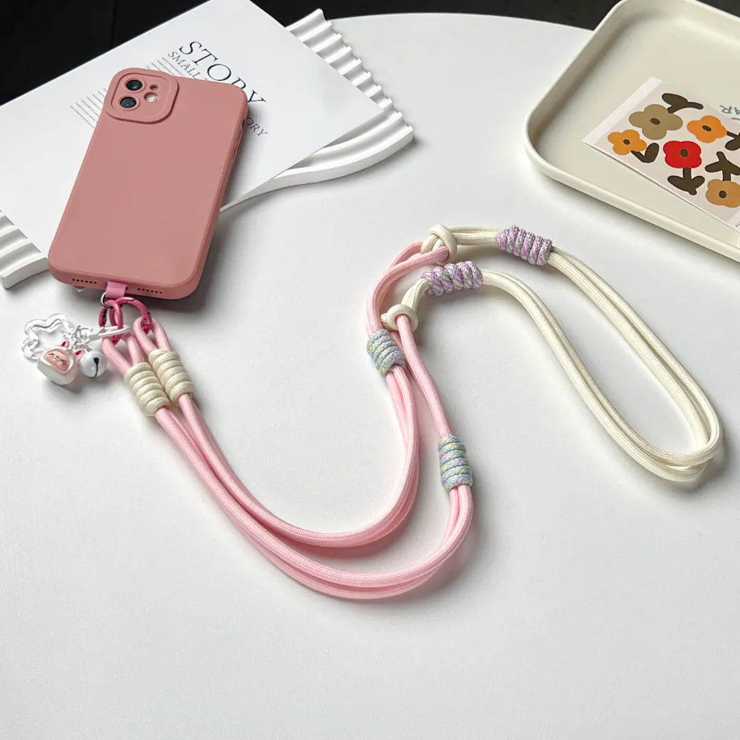 Adjustable length pink phone strap displayed clearly, suitable for different wearing preferences#color_pink