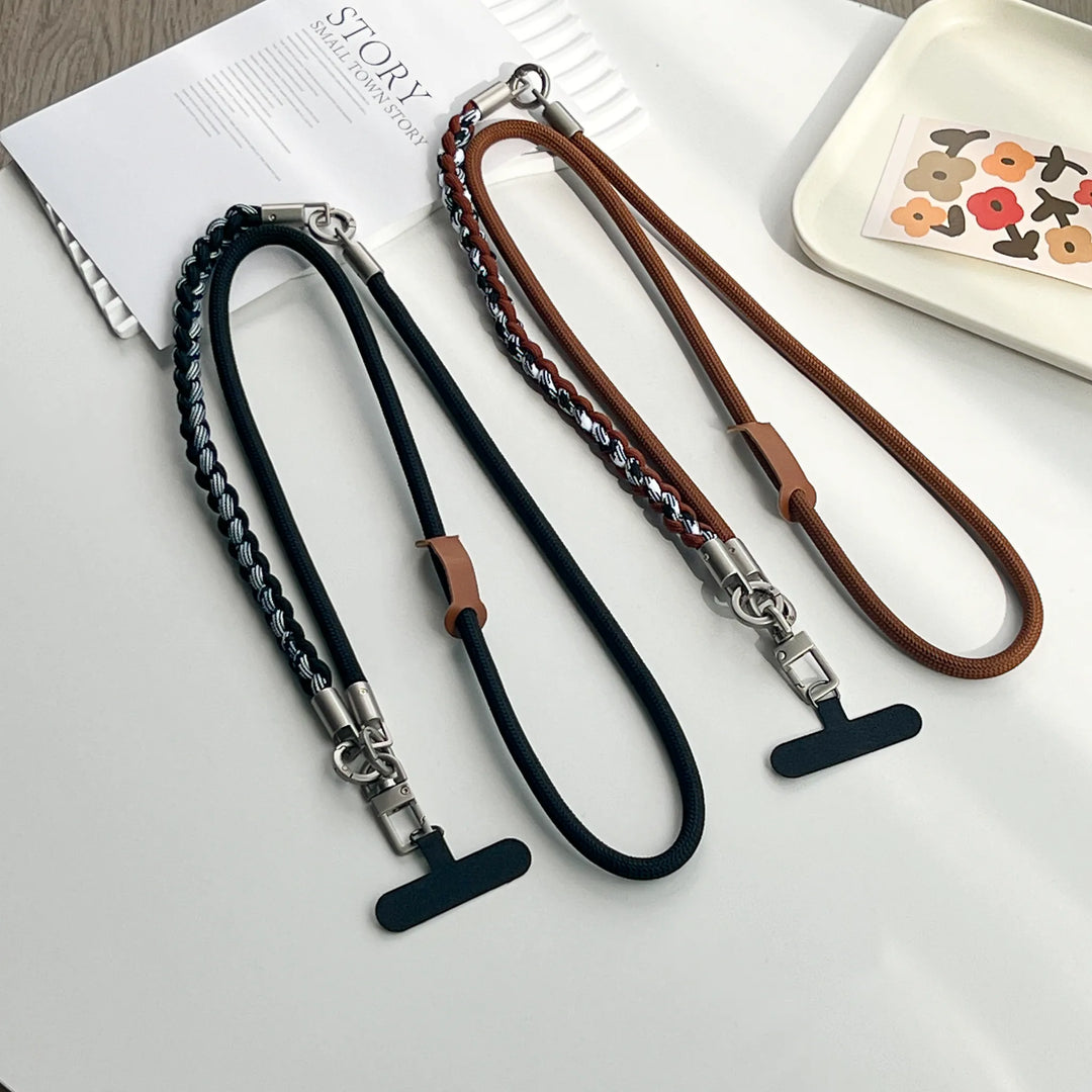 Adjustable crossbody phone strap in brown leather weave perfect for hands-free traveling#color_brown