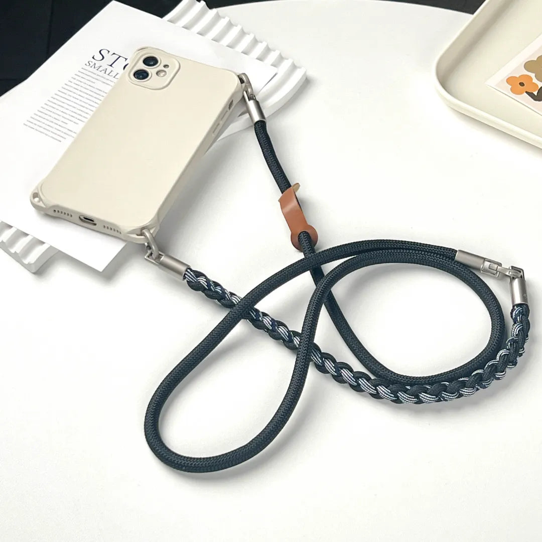 Rugged phone strap connection detail designed to reduce drops and support active daily use#color_black