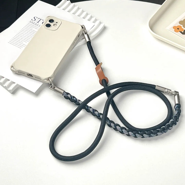 Rugged phone strap connection detail designed to reduce drops and support active daily use#color_black