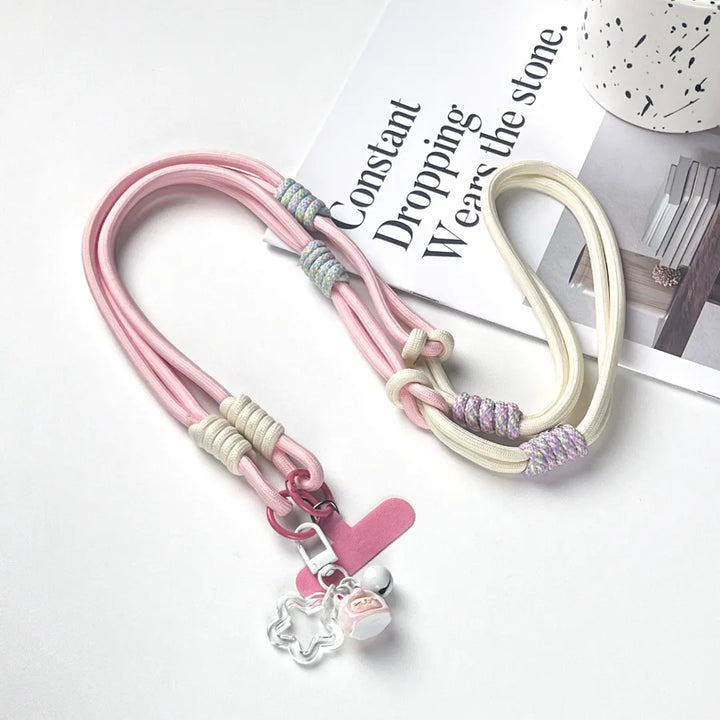 Soft color phone strap modular connection design shown on white background for secure phone attachment#color_pink