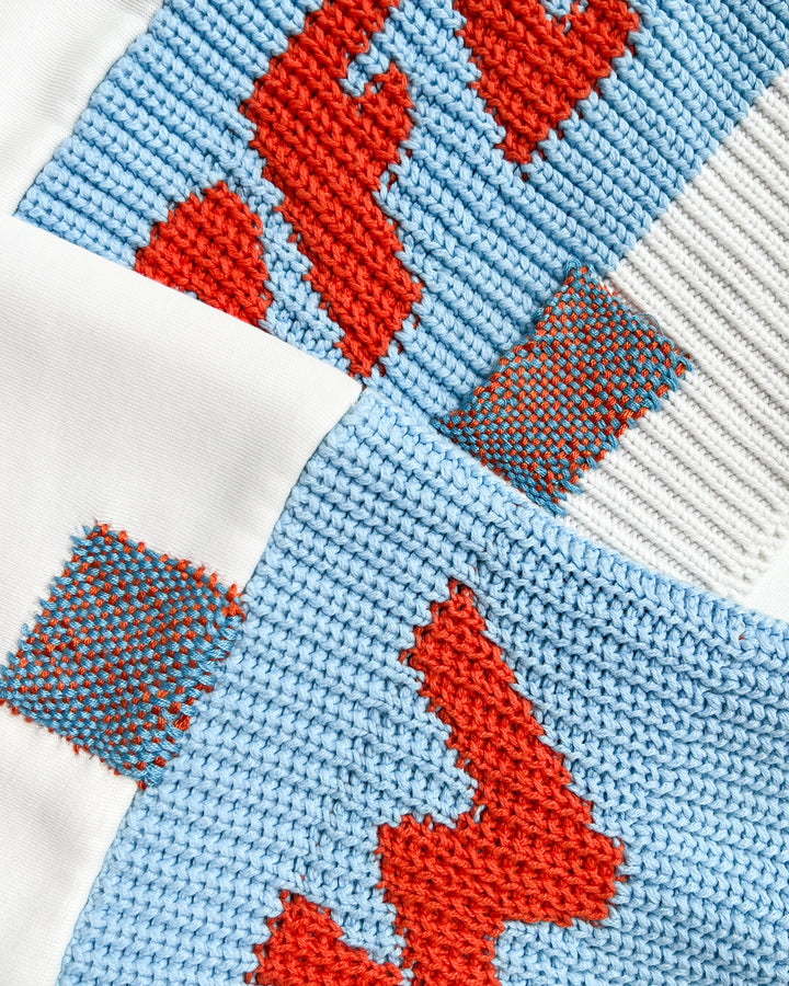 Visible mending result using weaving loom for creative fabric repair