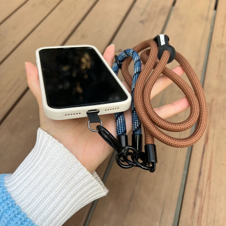 Secure and comfortable navy blue wrist phone strap for easy mobile phone management#color_brown